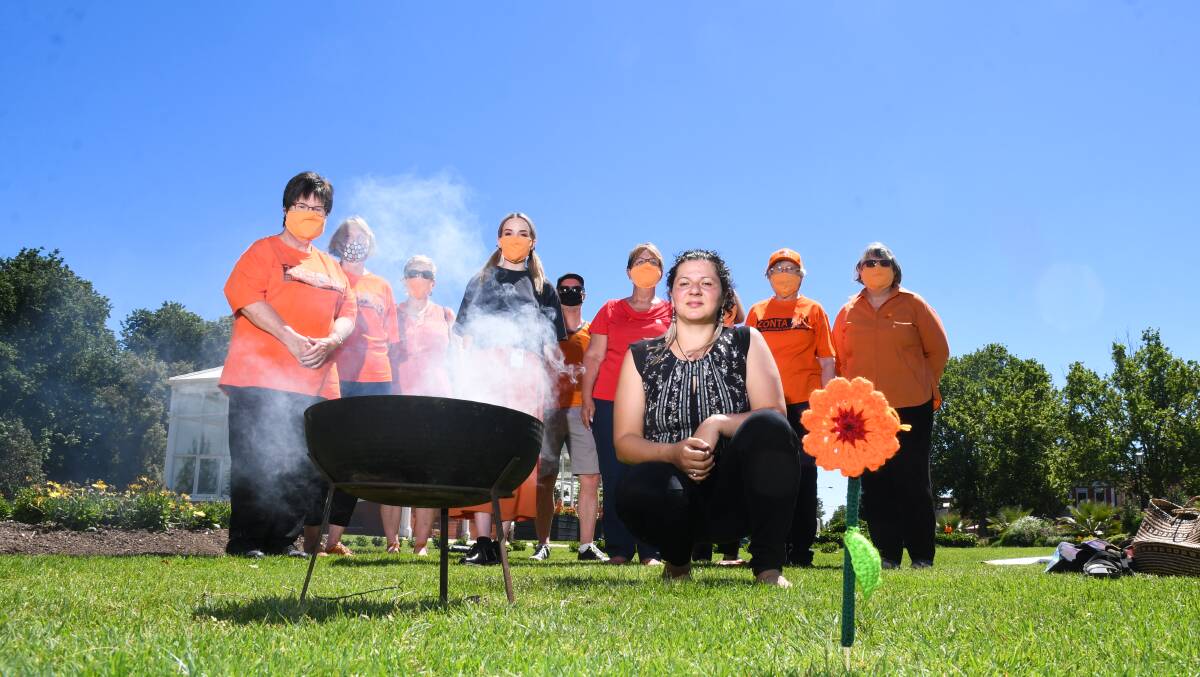 Djaara and Pangerang woman Rebecca Phillips and Greater Bendigo Against Family Violence supporters at the 16 Days of Activism launch. Picture: NONI HYETT