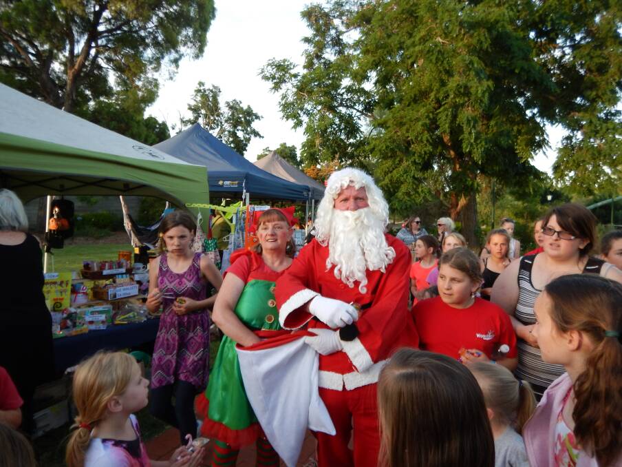 Santa Claus visits Wedderburn as the community celebrates Christmas. Picture: SUPPLIED