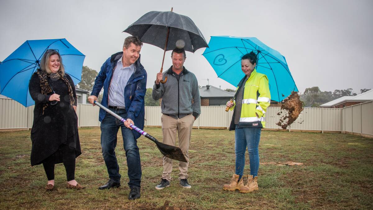 GROUND-BREAKING: Ann-Maree Davis, Paul Somerville, Ryan Kimm and Erin Connolly at the site of two new units. Picture: BRENDAN McCARTHY