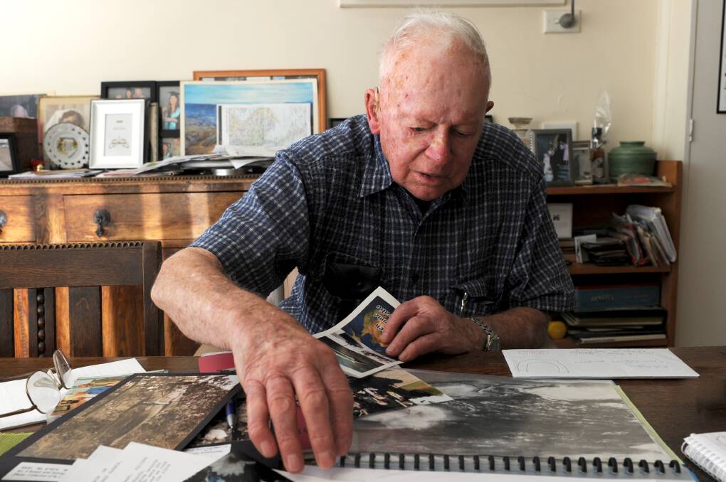 Bill Hosking has amassed a collection of images of and about Darwin during the Second World War. Picture: NONI HYETT