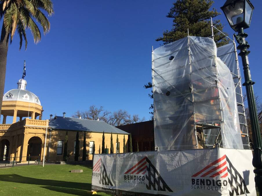 POLISH UP: The George Lansell statue near Bendigo's Sidney Myer Place, covered in scaffolding during renewal works. Picture: EMMA D'AGOSTINO