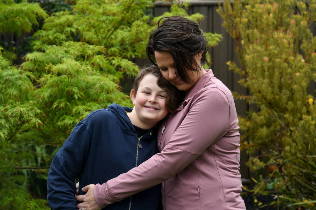 Rachelle Andrerson and her son, Jake. Rachelle experienced pain associated with endometriosis and adenomyosis even during her pregnancy. Picture: NONI HYETT