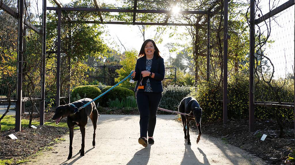 Pauline Murtagh with her dogs May and Murph. Ms Murtagh believes the city has scope for more dog parks. Picture: EMMA D'AGOSTINO