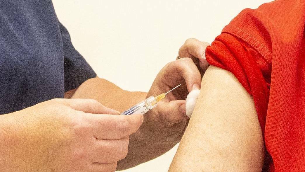 A vaccine is administered. Picture: DARREN HOWE