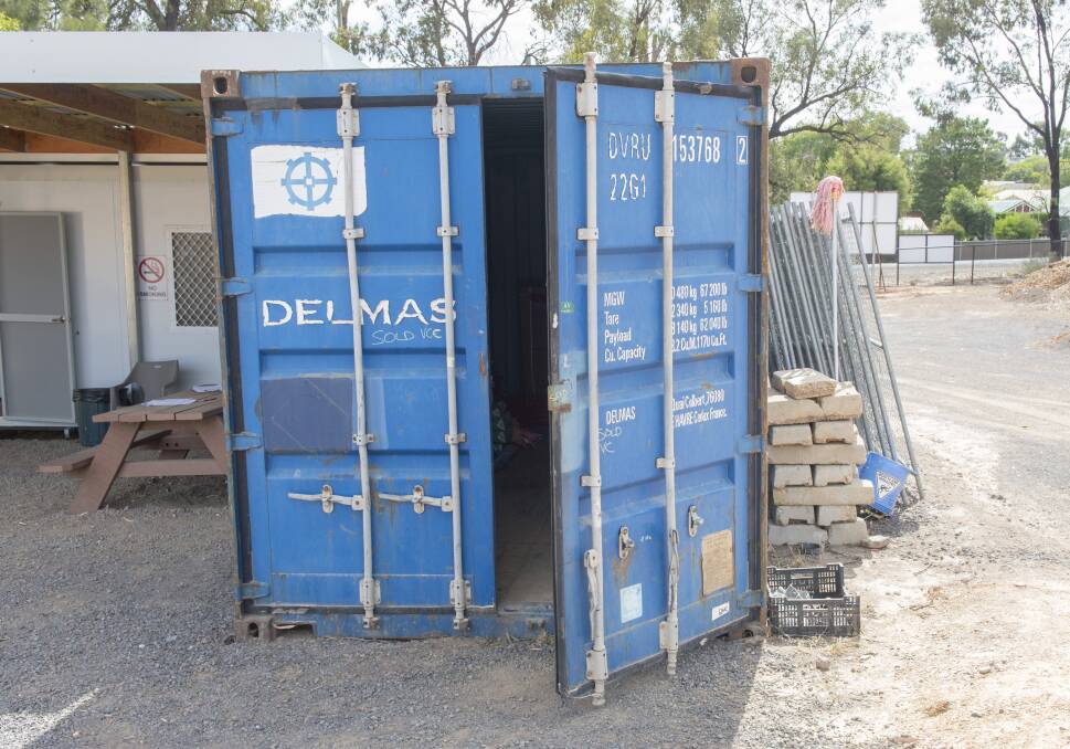 Police believe the offenders cut their way into this shipping container. Picture: DARREN HOWE