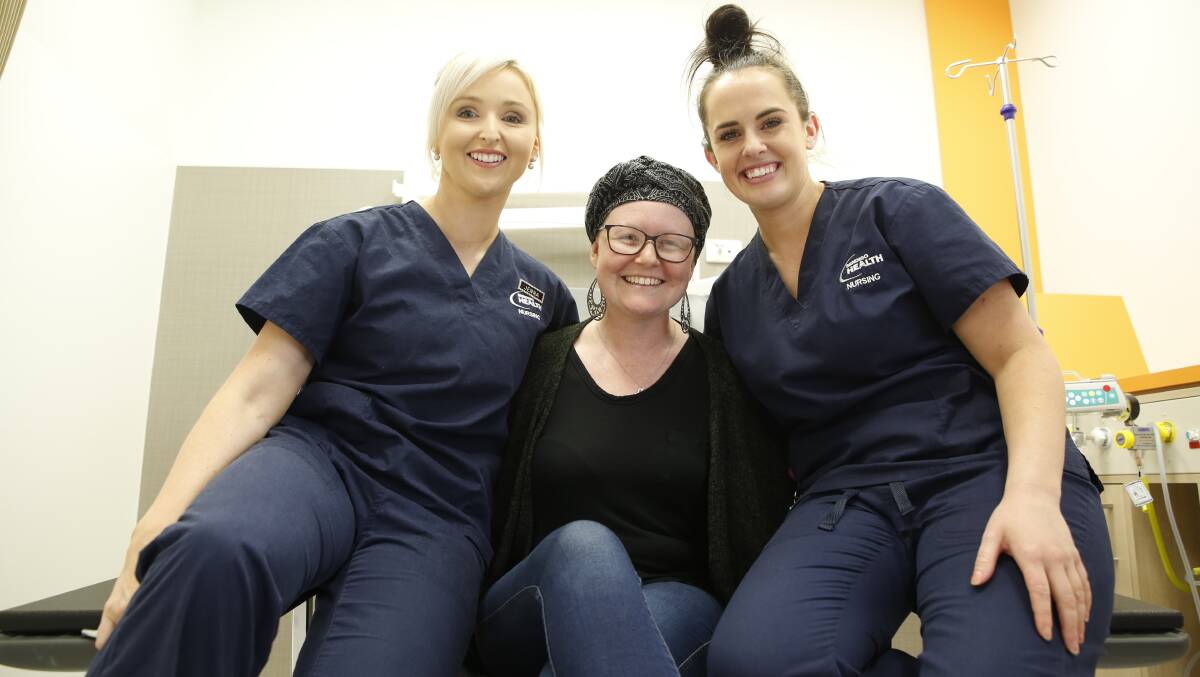 Samantha Heaslip, centre, with Bendigo Health oncology nurses Jenna Sing and Chloe Bath. Picture: EMMA D'AGOSTINO