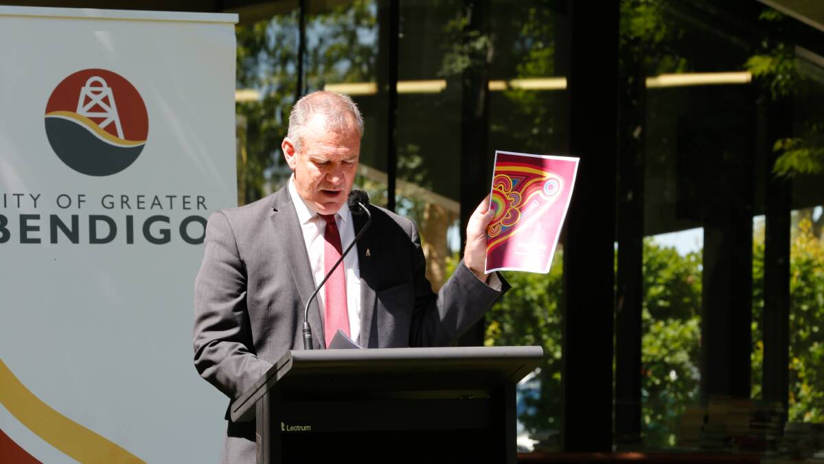 Craig Niemann with a copy of the city's new Reconciliation Plan. Picture: EMMA D'AGOSTINO
