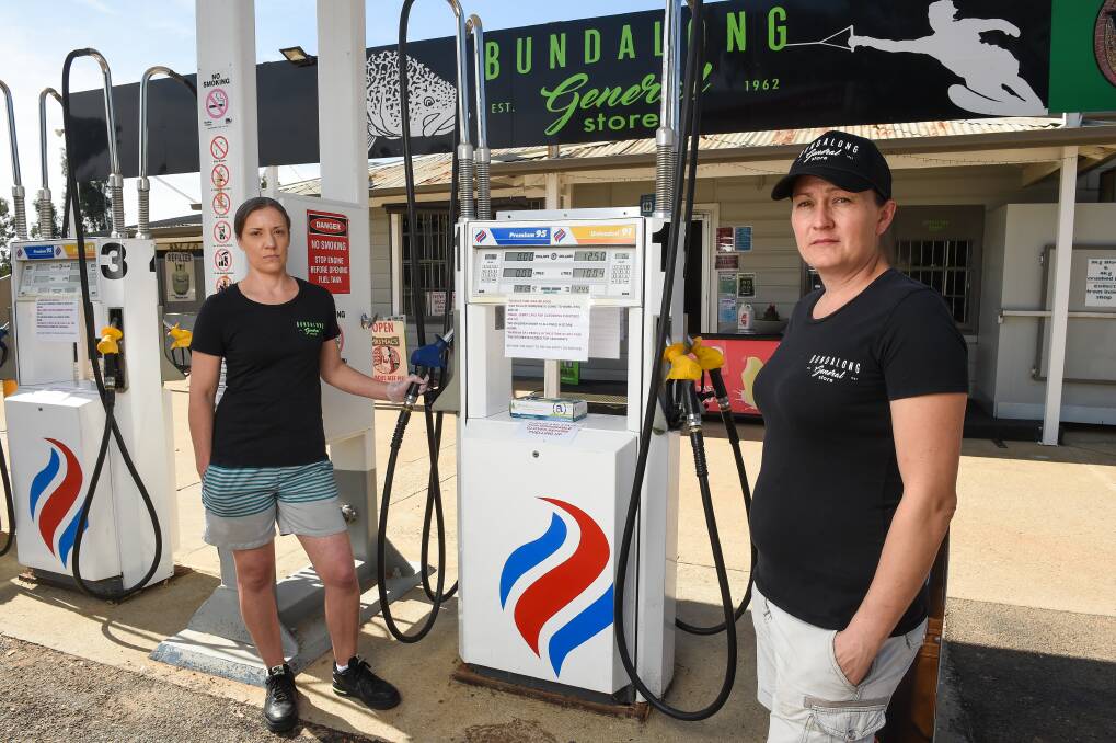 FUEL LIMIT: Bundalong General Store and Petrol Station owners Kellie Rogers and Mel Collins have put a limit on fuel for jerrycans. Pictures: MARK JESSER