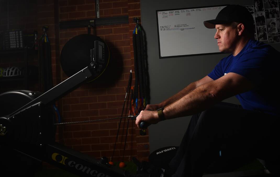 TKO Fitness owner Ryan Jeffrey trains at home alone, as ongoing restrictions mean indoor gyms cannot operate due to health concerns. Picture: DARREN HOWE 