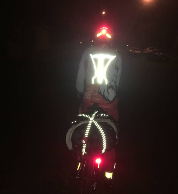 Stay visible and stay safe - cyclists should use flashing lights and choose light-coloured and reflective clothing . Photo: Maree Barkla