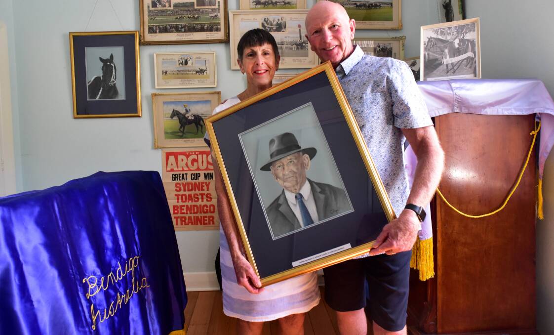 Cheryl and Morrie Hesse and some of their memorabilia now on display in Melbourne
