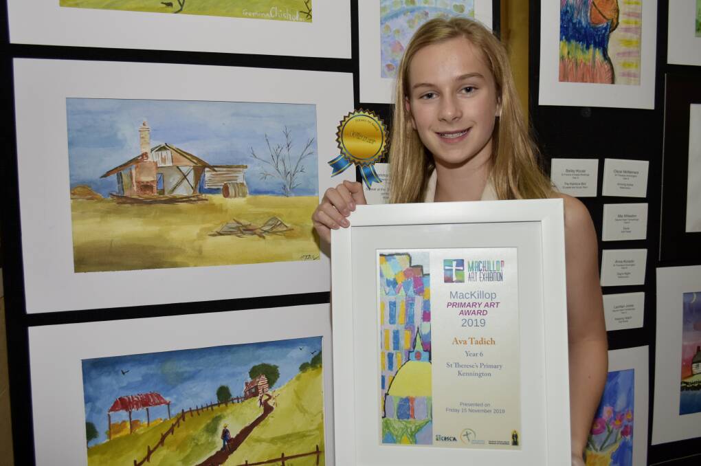 Ava Tadich from St Therese's Primary with her award and watercolour artwork. 