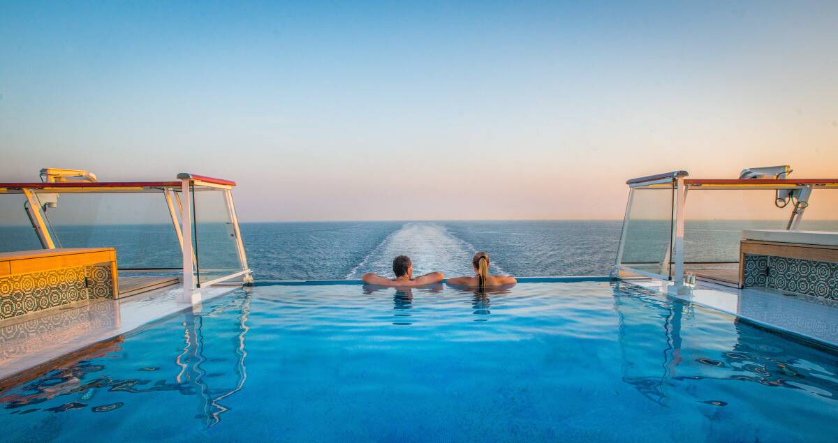 INDULGE: Take in the views across the Norwegian Sea from the onboard swimming pool.