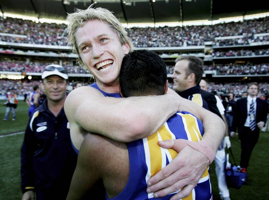 PREMIERSHIP SMILE: Adam Selwood embraces team-mate David Wirrapanda after West Coast's one-point grand final win over Sydney in 2006. Picture: GETTY IMAGES