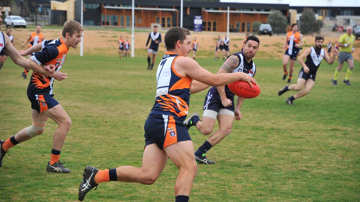 ON THE CHARGE: Maiden Gully YCW's Jake Klemm gets ready to sink his boot into the ball against Inglewood on Saturday. The Eagles won by 156 points. Picture: KIERAN ILES