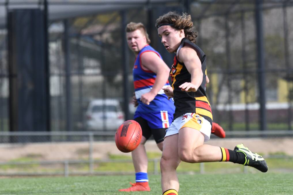 TOP GAME: Rover Austin Windridge was one of Leitchville-Gunbower's best players against North Bendigo at Atkins Street on Saturday. Pictures: NONI HYETT
