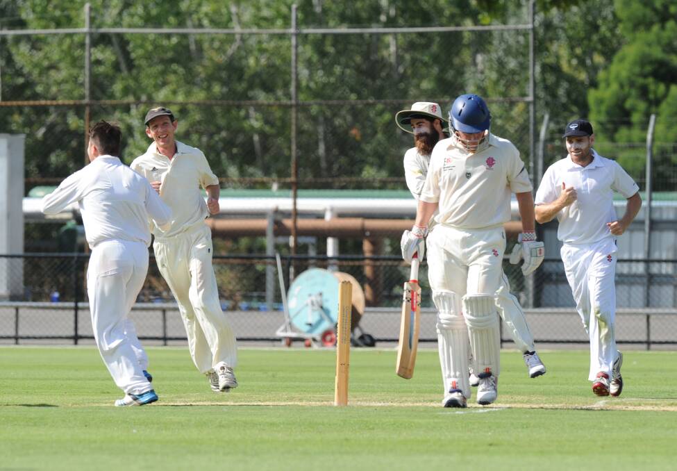 BACK TO THE PAVILION: Bendigo United's Heath Behrens begins the long walk back after being trapped lbw for 25.