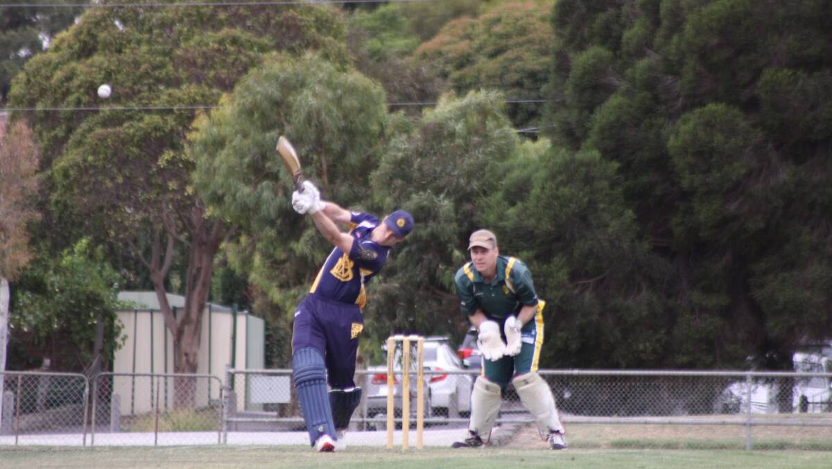 CRACK: Andrew Chalkley goes large during his innings of 72 for Bendigo against Leongatha on Thursday. Picture: TRAVIS HARLING