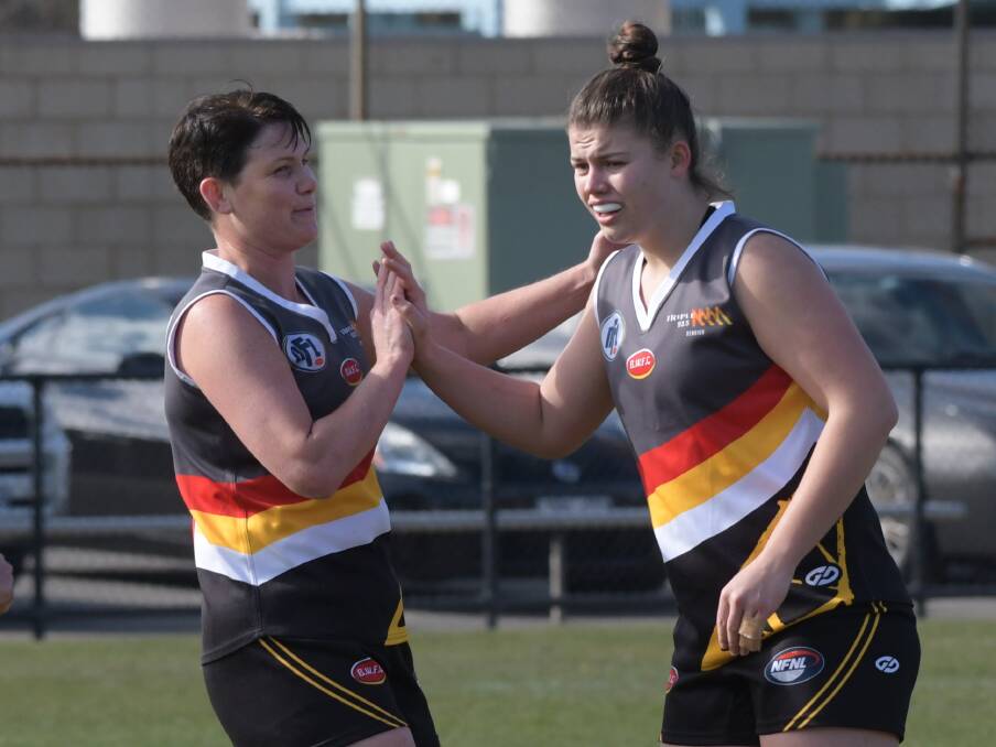 FIREPOWER: Andrea Walsh and Bella Ayre combined for 11 goals for the Bendigo Thunder. Walsh booted six and Ayre slotted five. Picture: NON I HYETT