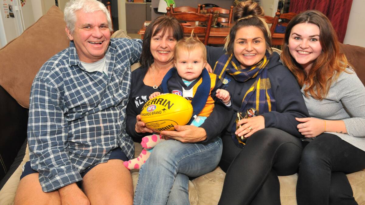 PROUD: Tom Cole's parents Russell and Donna, niece Lotti, and sisters Gabrielle and Darcey are all smiles ahead of his AFL debut. Picture: LUKE WEST