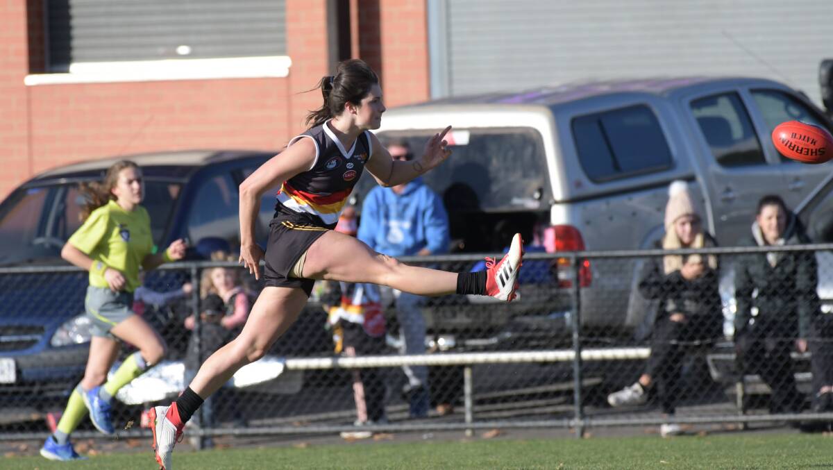 TOP GAME: Carly Ladson kicked one goal and was one of the Bendigo Thunder's best players in Sunday's victory at the QEO. Pictures: NONI HYETT