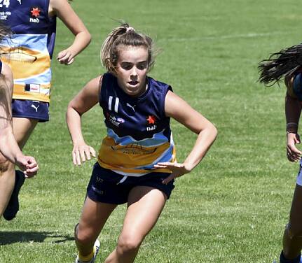 DETERMINED: Maeve Tupper in action for the Bendigo Pioneers during the brief 2020 season.