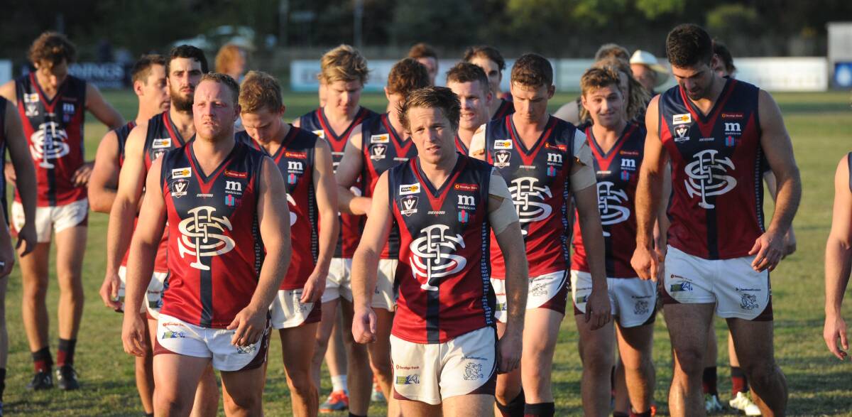 DEFEATED: Sandhurst players trudge off the ground following their 13-point loss to Strathfieldsaye in the opening round of the season.