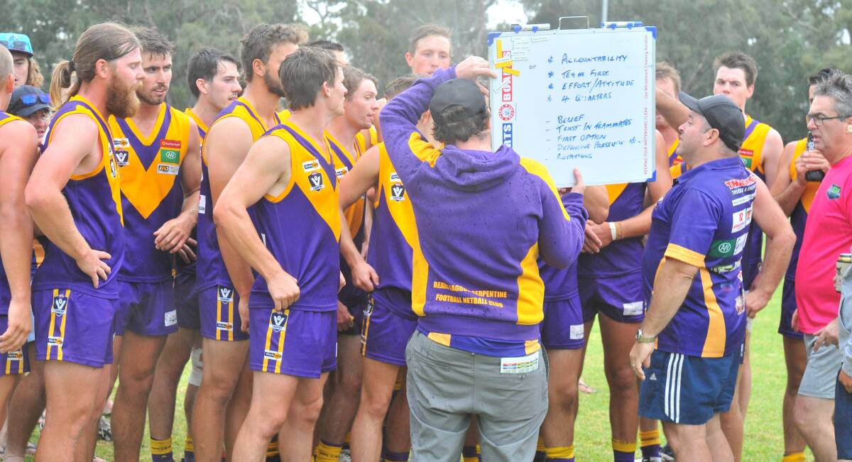 BIG IMPROVERS: Bears Lagoon-Serpentine coach Greg Gadsden addresses his players at three quarter-time on Saturday against Marong. Pictures: LUKE WEST