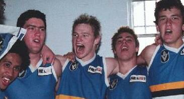 FULL VOICE: Colin Sylvia (second from left) celebrates one of the Bendigo Pioneers' wins at the QEO in the 2003 TAC Cup season - a year they made the preliminary final.