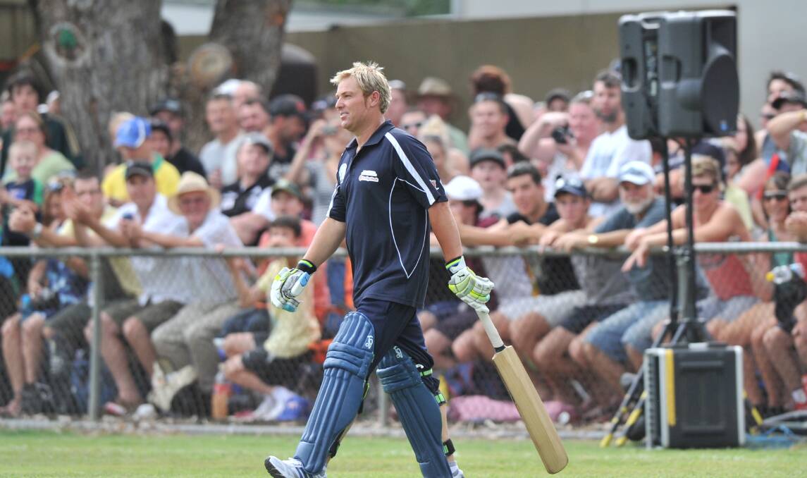 COMING OUT TO BAT: Shane Warne playing for the All-Star XI on his way to the wicket in the John Forbes Tribute Match in February, 2011.