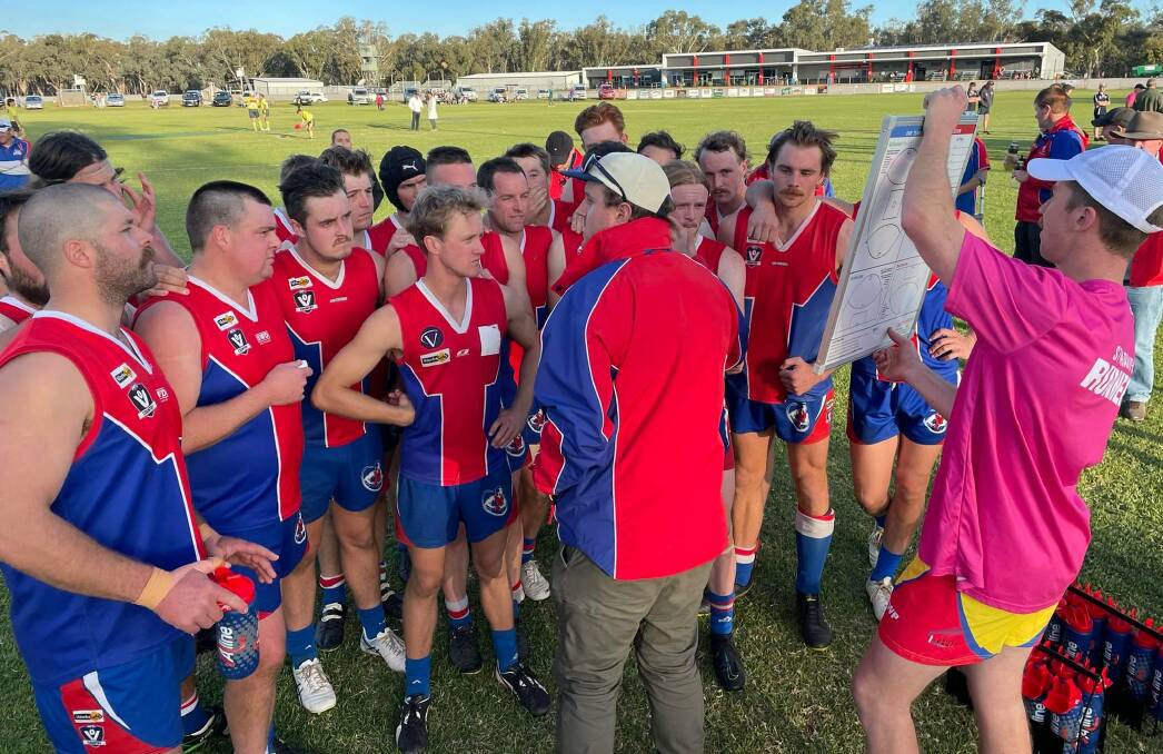 St Arnaud players listen to coach Torin Petrie at three quarter-time of Saturday's clash. Picture: ST ARNAUD FACEBOOK PAGE
