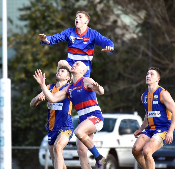 JUMPING JACK: Gisborne forward Jack Scanlon leaps for a mark in the third quarter of Saturday's hard-fought win over Golden Square at Wade Street. Picture: GLENN DANIELS