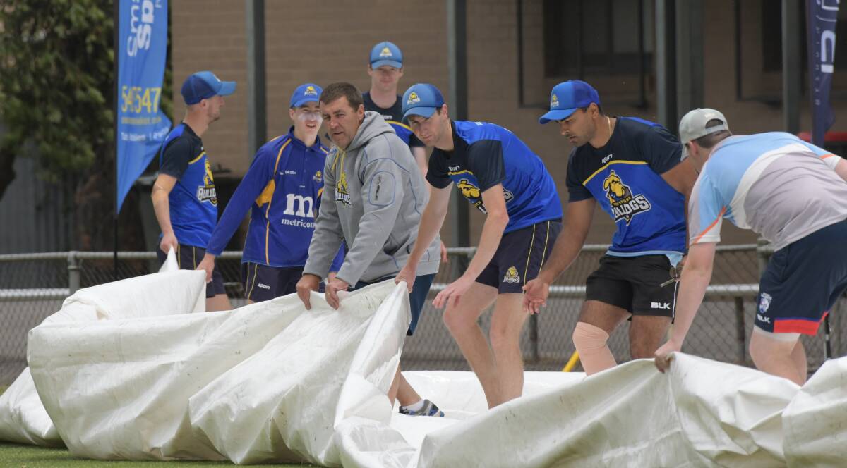 FRUSTRATING: Covers were required at Wade Street on Saturday as rain twice delayed play between Square and Strathdale-Maristians. Square won by five wickets.