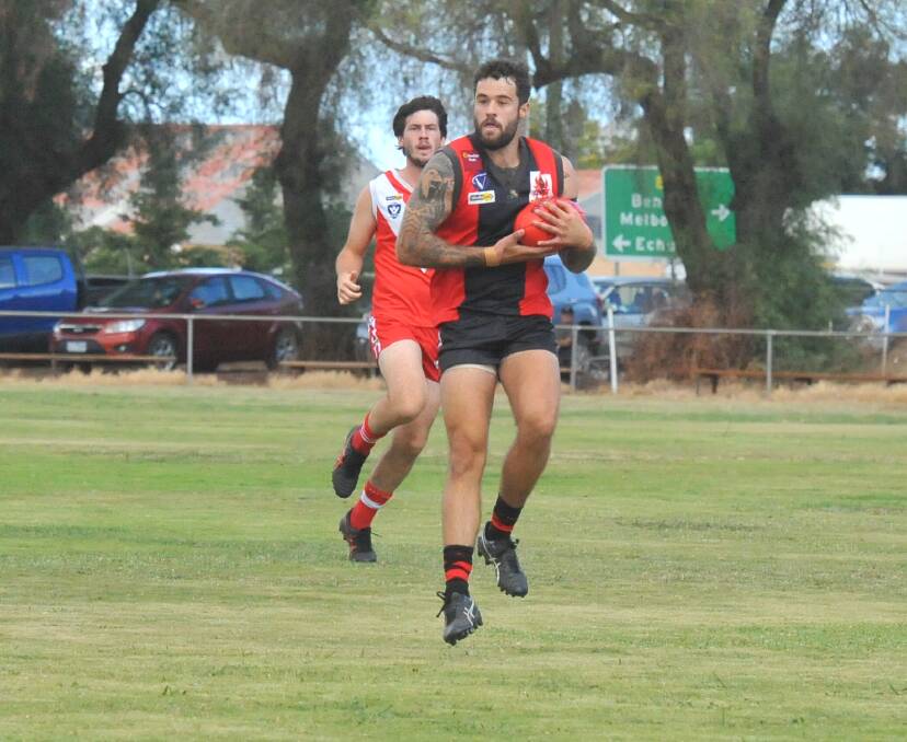 IMPRESSIVE DEBUT: Recruit Sean Christopher kicked 11 goals in his first game for White Hills against Elmore on Saturday. Pictures: LUKE WEST