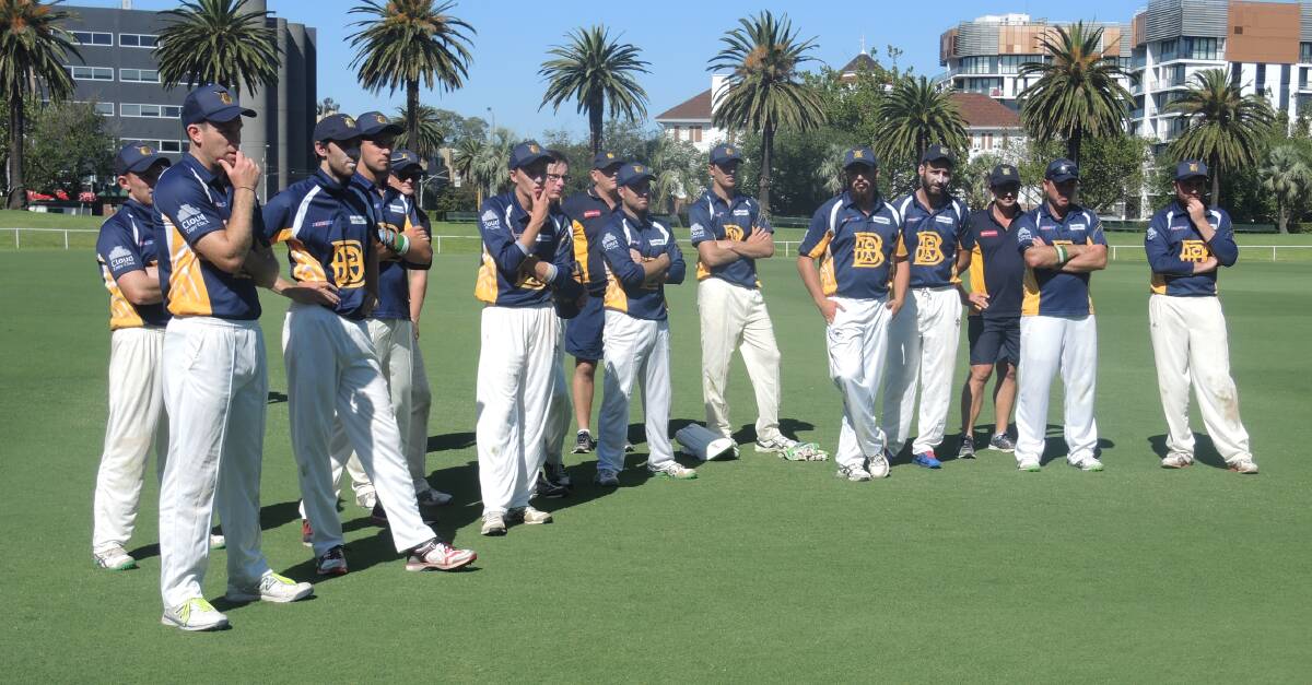 SO CLOSE: Disappointed Bendigo players at the presentation following Friday's four-wicket Melbourne Country Week grand final loss to Geelong. Picture: LUKE WEST