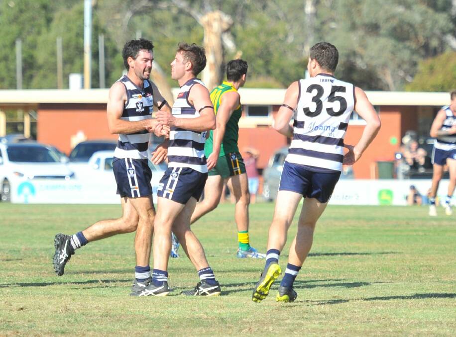 UP AND ABOUT EARLY: Lockington-Bamawm United celebrates one of its nine first-quarter goals during its onslaught against Colbinabbin in their Good Friday encounter at M.J. Morgan Oval. The Cats improved to 3-0 with their 36-point victory. Picture: LUKE WEST