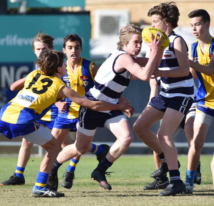 FUTURE OF THE GAME: Golden Square and Strathfieldsaye do battle in an under-14 game at Wade Street last year. Picture: DARREN HOWE