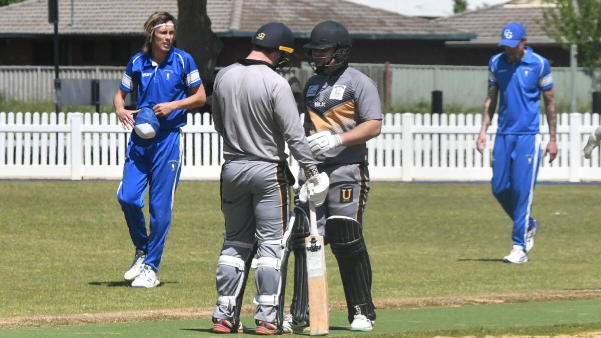 United batsmen Mac Whittle and Mitch Blackman discuss the state of play between overs against California Gully on Saturday. Picture by Luke West