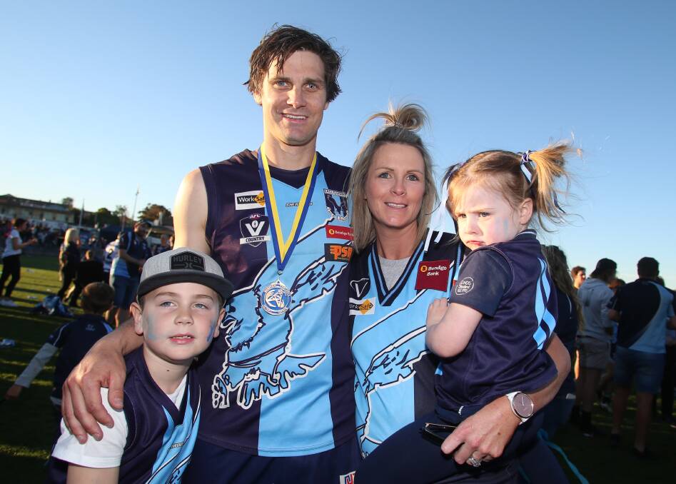 SPECIAL DAY: Eaglehawk captain Tim Hill with wife Jo and children Dusty and Molly after Saturday's grand final win against Strathfieldsaye. Picture: GLENN DANIELS