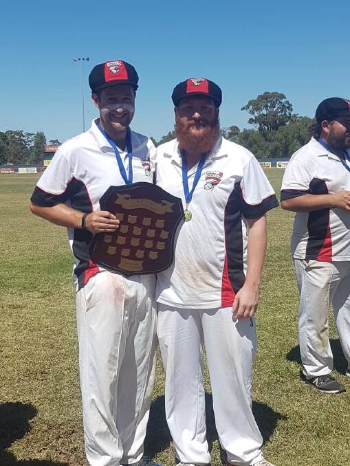 JOB WELL DONE:  Arnold vice-captain Brenden Younghusband and skipper Michael Dale following Saturday's ULCA grand final win over Kingower.