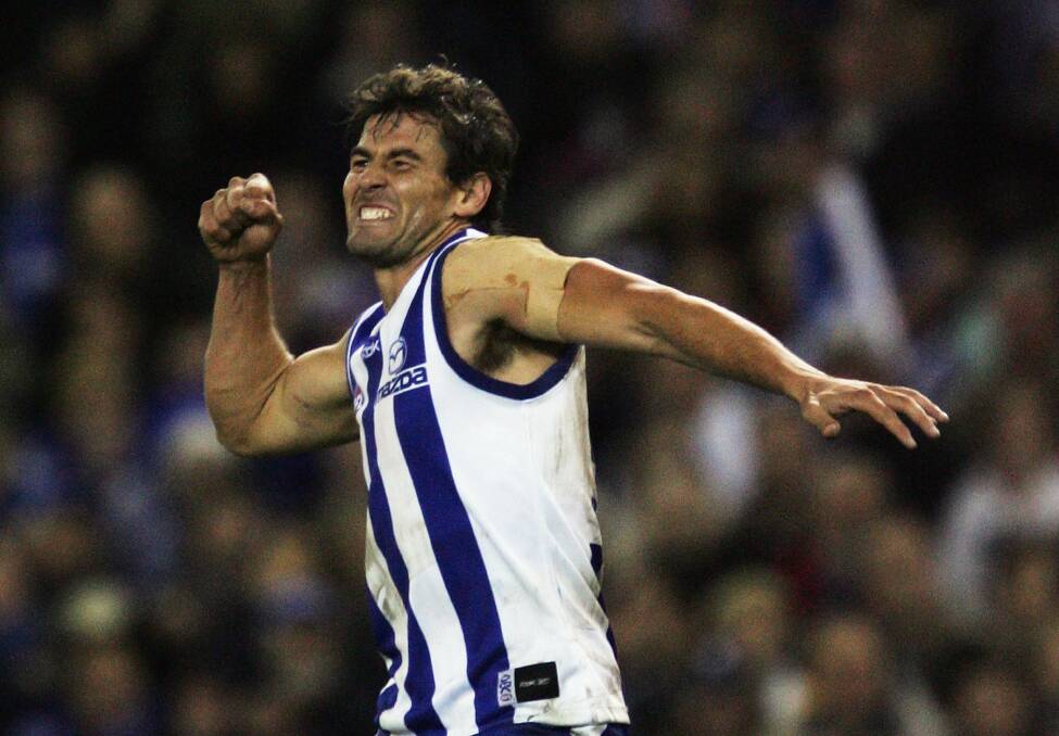 UP AND ABOUT: Nathan Thompson in 2006 celebrates one of the 135 goals he kicked for North Melbourne during his 60 games for the Roos. Picture: GETTY IMAGES