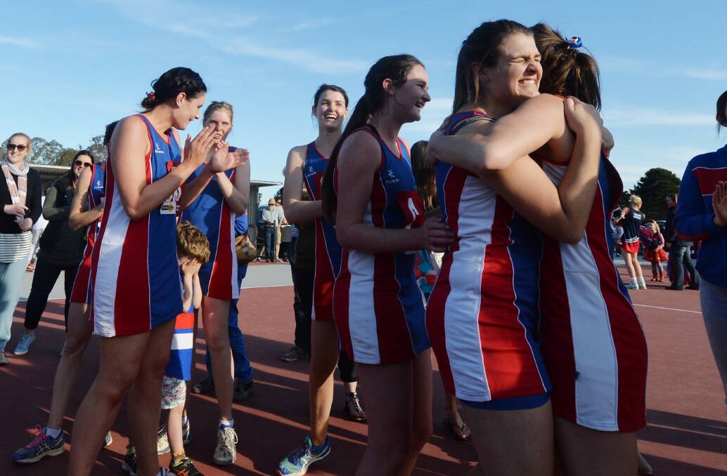 PREMIERSHIP DELIGHT: Pyramid Hill netballers are all smiles as they celebrate their thrilling A-grade victory over Calivil United, 31-29. Picture: DARREN HOWE