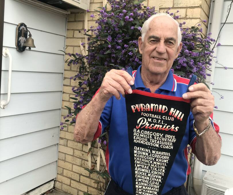 LAST MAN STANDING: John Carroll is the only surviving member of Pyramid Hill's last premiership team of 1950. Pictures: LUKE WEST
