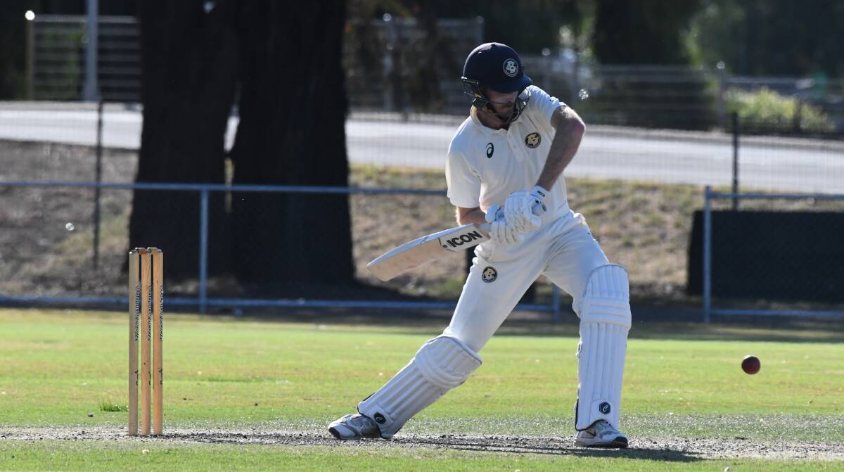 WATCHFUL: Bendigo captain Shane Koop faces one of his 305 deliveries during his century against Sandhurst on Saturday. Koop's unbeaten 102 at Weeroona Oval was his first ton for the Goers. Picture: ADAM BOURKE