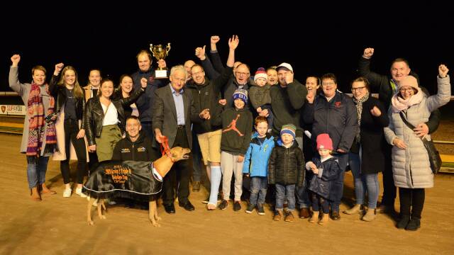 Crimson Vixen with her winning connections. Picture: CLINT ANDERSON