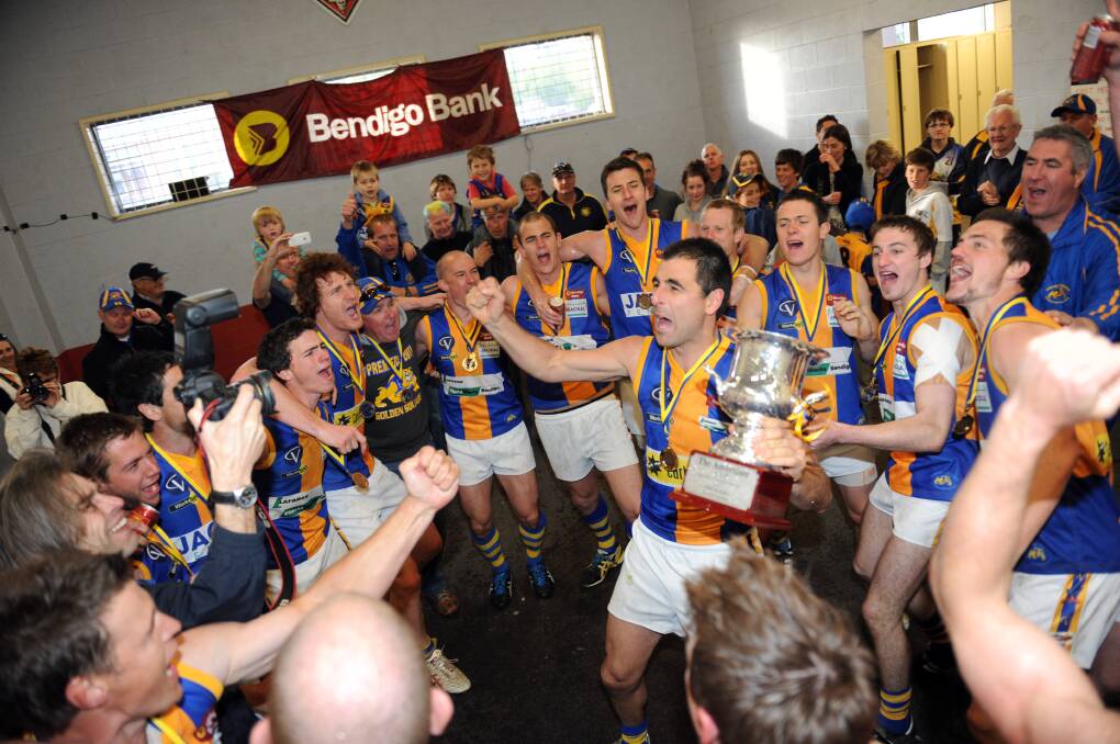 PARTY TIME: Golden Square players and supporters celebrate their undefeated 2011 premiership after beating Eaglehawk by 135 points in the grand final.