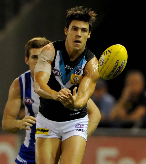 POWER DAYS: Angus Monfries playing for Port Adelaide in the 2014 season. Monfries played 61 games for the Power from 2013 to 2017. Pictures: FAIRFAX MEDIA