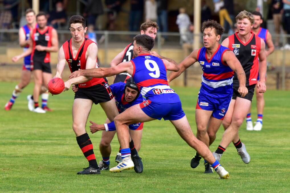 DEMONS DELIVER: White Hills ended North Bendigo's 37-game home winning streak at Atkins Street on Saturday. Pictures: BRENDAN McCARTHY