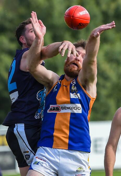 BIG WORKLOAD: Eaglehawk's Jack Lawton and Golden Square's Matt Compston were kept busy in their ruck duel on Saturday. Picture: DARREN HOWE