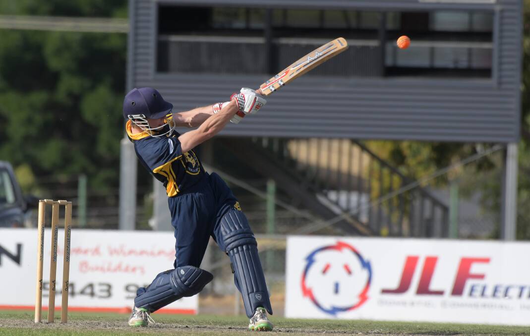 WHACK: Bendigo's William Collicoat launches during his entertaining innings of 36 off 19, which included four sixes.
